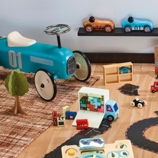 Vintage kovové odrážadlo svetlo modré