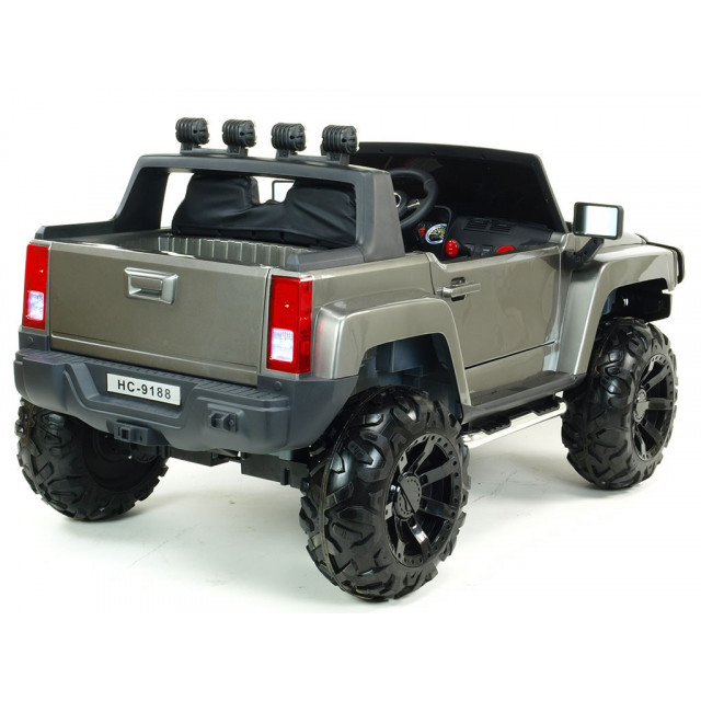 2-stný Hummer Simba s 2,4G DO,EVA kolesami,kývajúcimi nápravami,tlmičmi,USB,TF,Mp3,voltmetrom,čalunenou sedačkou,strieborná met.