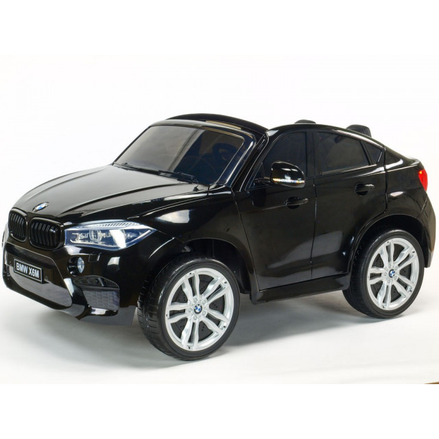 BMW X6 s 2,4G bluetooth DO, EVA kolesami, otváracími dverami,12V, čalunenou vyšívanou sedačkou, lakované čiernou farbou