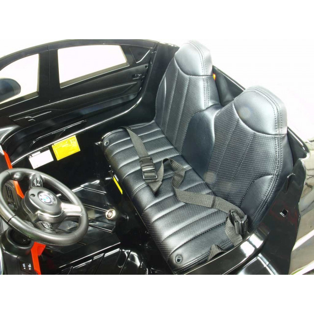 BMW X6 s 2,4G bluetooth DO, EVA kolesami, otváracími dverami,12V, čalunenou vyšívanou sedačkou, lakované čiernou farbou