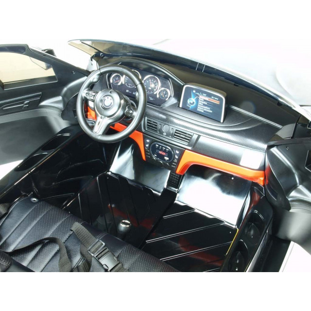 BMW X6 s 2,4G bluetooth DO, EVA kolesami, otváracími dverami,12V, čalunenou vyšívanou sedačkou, lakované čiernou farbou