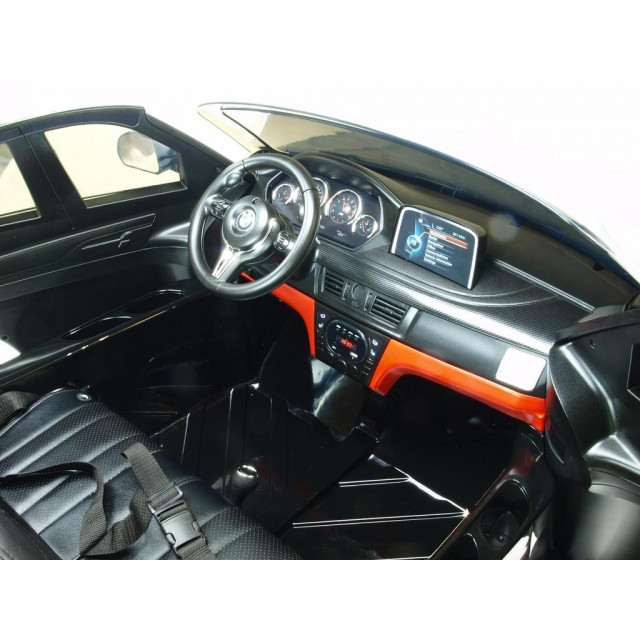 BMW X6 s 2,4G bluetooth DO, EVA kolesami, otváracími dverami,12V, čalunenou vyšívanou sedačkou, lakované čiernou farbou