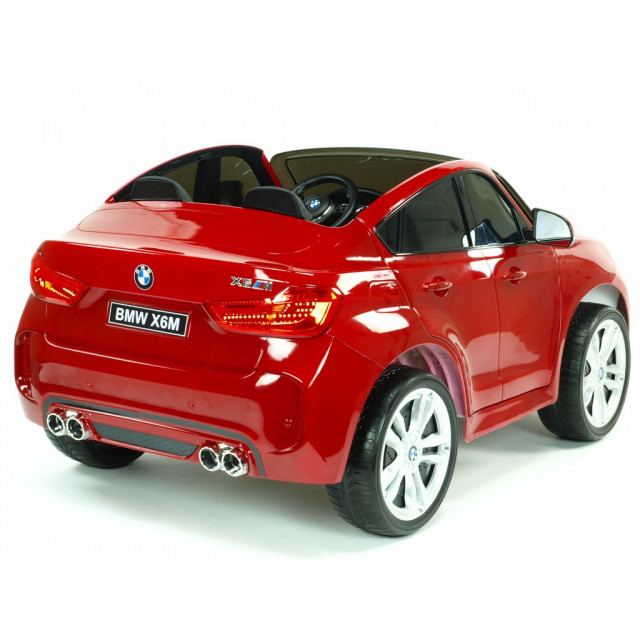 BMW X6 s 2,4G bluetooth DO, EVA kolesami, otváracími dverami,12V, čalunenou vyšívanou sedačkou, lakované čiernou farbou