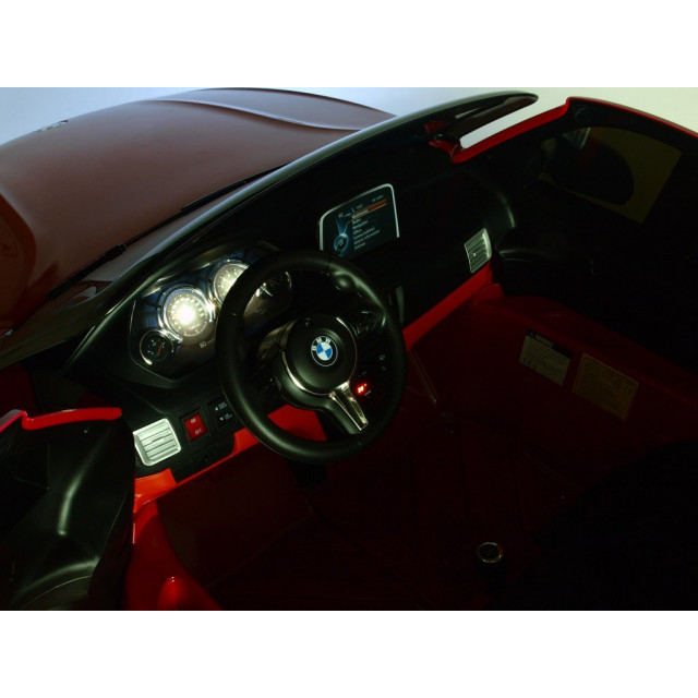 BMW X6 s 2,4G bluetooth DO, EVA kolesami, otváracími dverami,12V, čalunenou vyšívanou sedačkou, lakované čiernou farbou