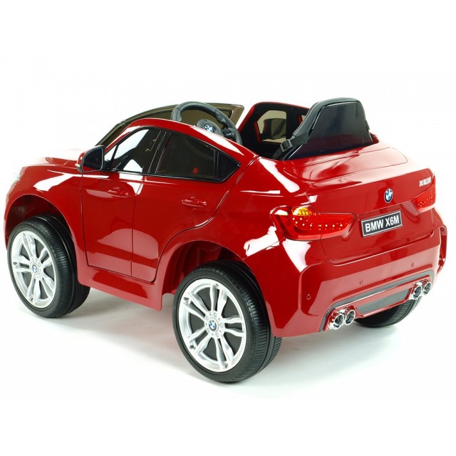 BMW X6 s 2,4G bluetooth DO, EVA kolesami, otváracími dverami,12V, čalunenou vyšívanou sedačkou, lakované čiernou farbou