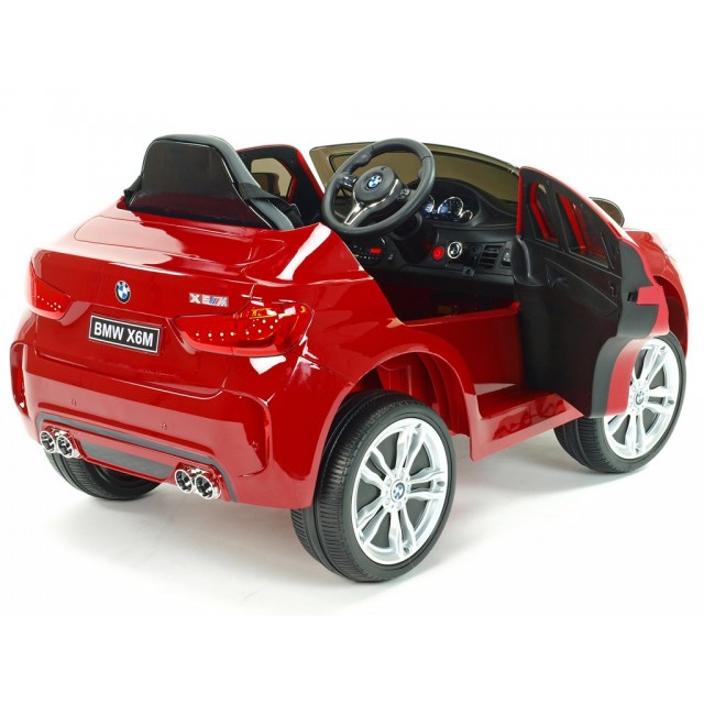 BMW X6 s 2,4G bluetooth DO, EVA kolesami, otváracími dverami,12V, čalunenou vyšívanou sedačkou, lakované čiernou farbou