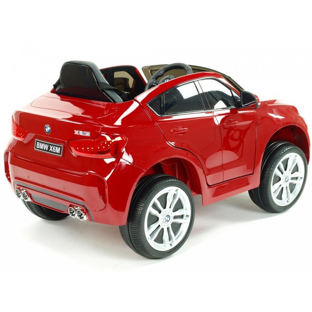 BMW X6 s 2,4G bluetooth DO, EVA kolesami, otváracími dverami,12V, čalunenou vyšívanou sedačkou, lakované čiernou farbou