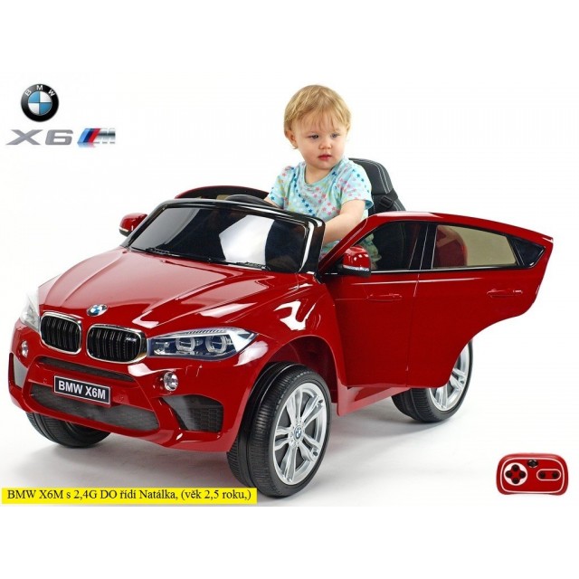BMW X6 s 2,4G bluetooth DO, EVA kolesami, otváracími dverami,12V, čalunenou vyšívanou sedačkou, lakované čiernou farbou