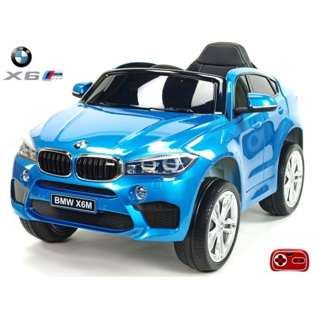 BMW X6 s 2,4G bluetooth DO, EVA kolesami, otváracími dverami,12V, čalunenou vyšívanou sedačkou, lakované čiernou farbou