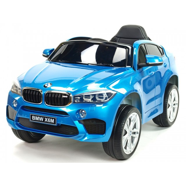 BMW X6 s 2,4G bluetooth DO, EVA kolesami, otváracími dverami,12V, čalunenou vyšívanou sedačkou, lakované čiernou farbou