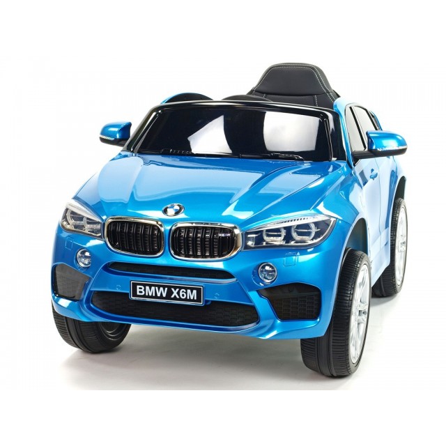 BMW X6 s 2,4G bluetooth DO, EVA kolesami, otváracími dverami,12V, čalunenou vyšívanou sedačkou, lakované čiernou farbou