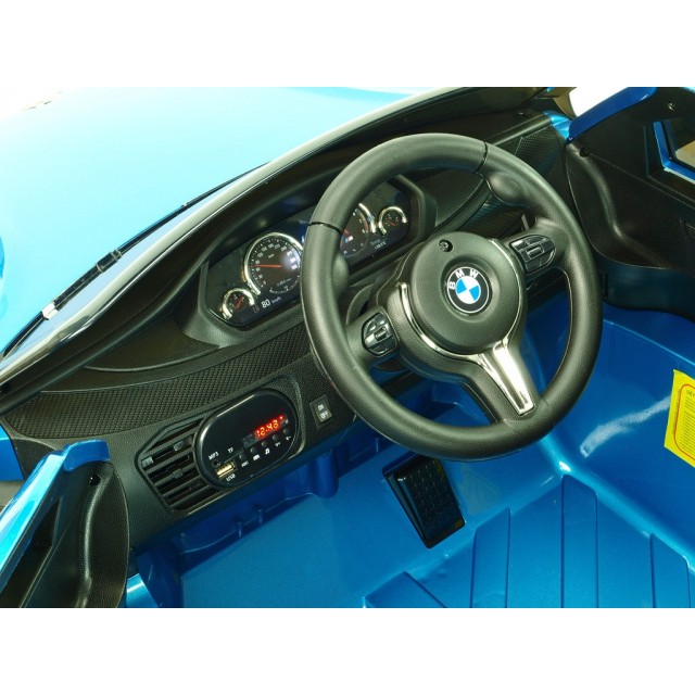 BMW X6 s 2,4G bluetooth DO, EVA kolesami, otváracími dverami,12V, čalunenou vyšívanou sedačkou, lakované čiernou farbou