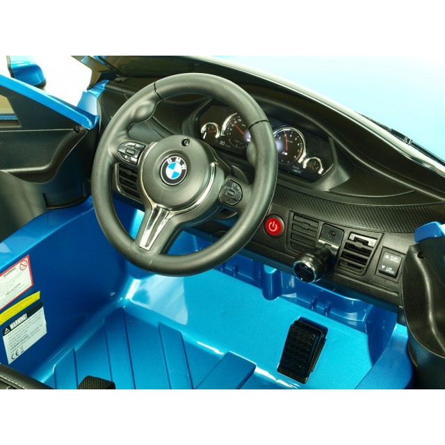 BMW X6 s 2,4G bluetooth DO, EVA kolesami, otváracími dverami,12V, čalunenou vyšívanou sedačkou, lakované čiernou farbou