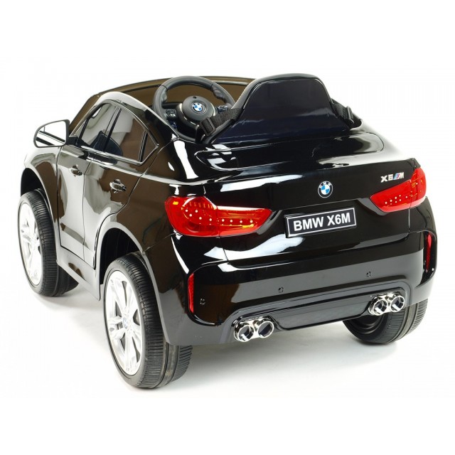BMW X6 s 2,4G bluetooth DO, EVA kolesami, otváracími dverami,12V, čalunenou vyšívanou sedačkou, lakované čiernou farbou