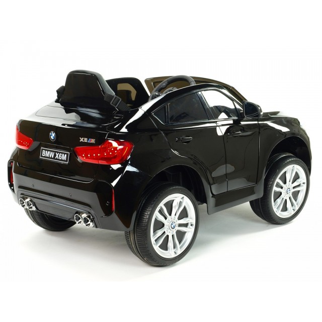 BMW X6 s 2,4G bluetooth DO, EVA kolesami, otváracími dverami,12V, čalunenou vyšívanou sedačkou, lakované čiernou farbou