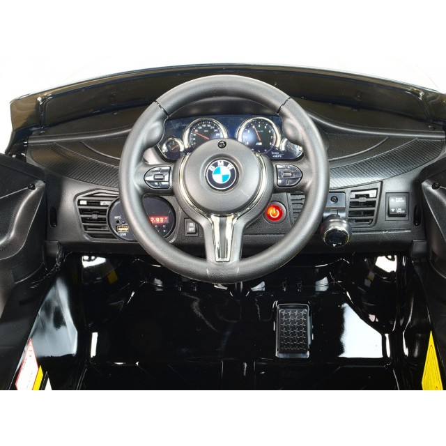 BMW X6 s 2,4G bluetooth DO, EVA kolesami, otváracími dverami,12V, čalunenou vyšívanou sedačkou, lakované čiernou farbou